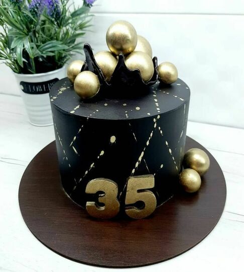 Торт на 35 черный с золотом №475308